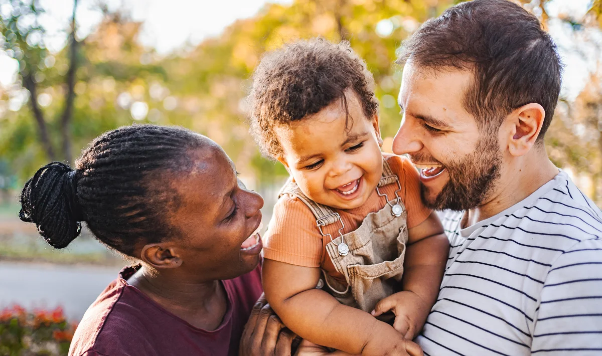 Parents holding child